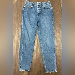 Urban Outfitters BDG Mom High-Rise Jeans in a classic vintage light wash.